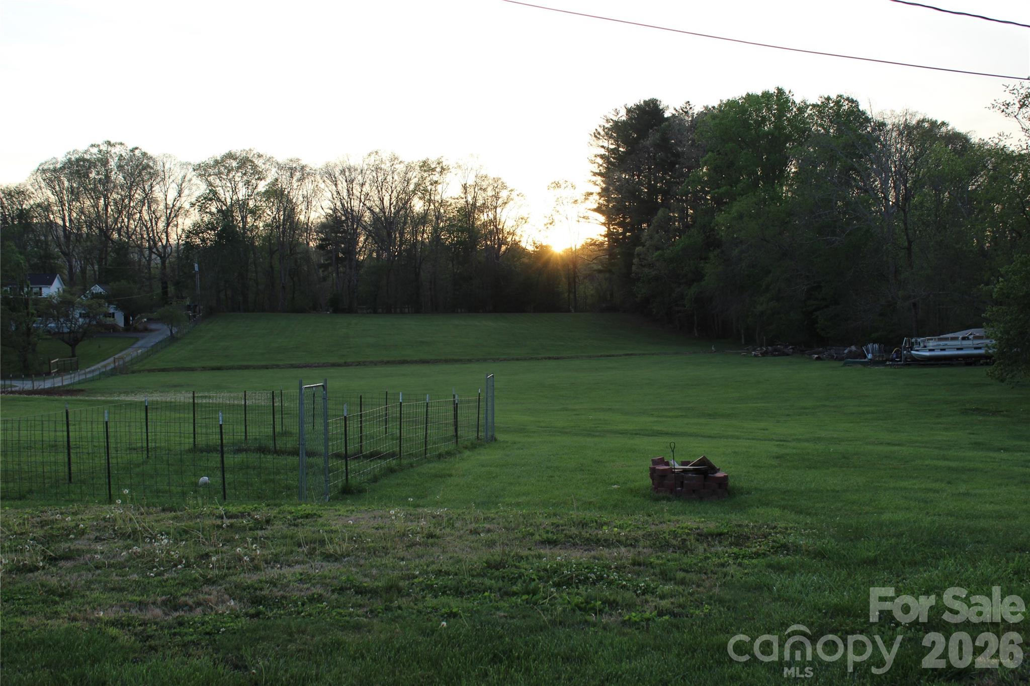 300 Banner Farm Road Mills River, NC 28759 - Photo 7 of 21 a backyard of a house with lots of green space