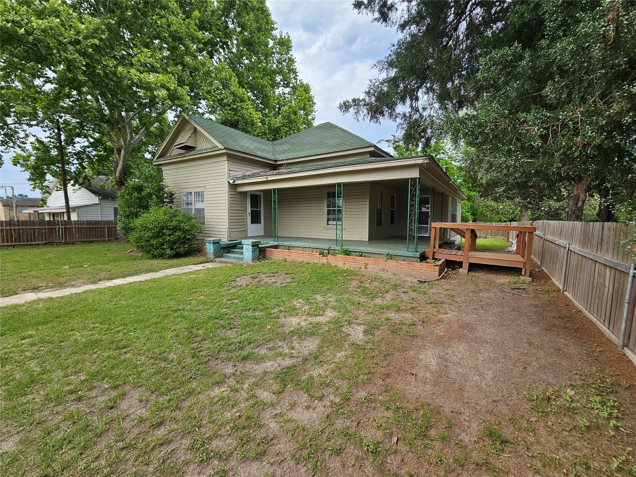 11 Smith Street Shepherd, TX 77371 - Photo 2 of 31 a front view of house with yard and green space