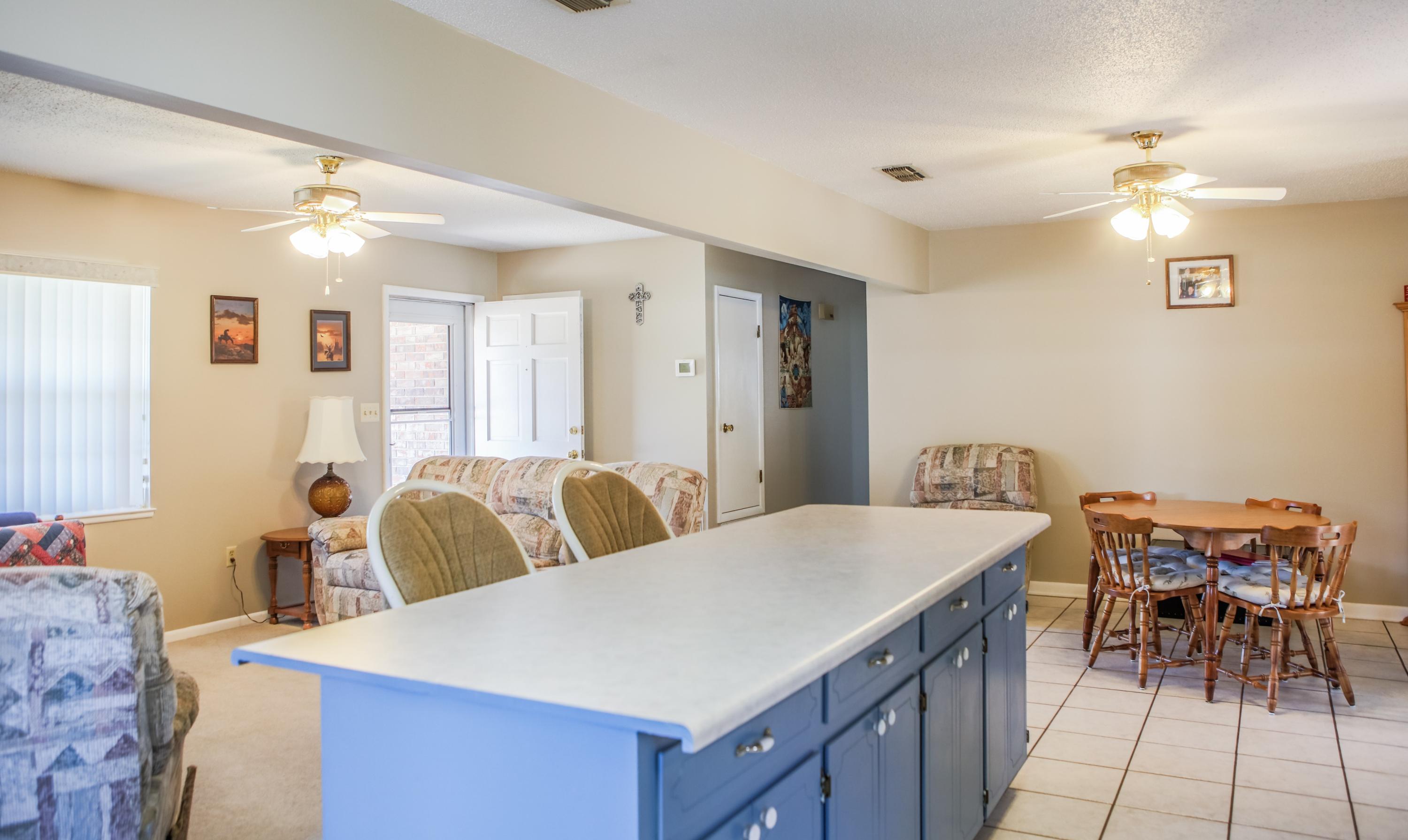 1307 Valley Road Crestview, FL 32539 - Photo 4 of 26 Kitchen Island with breakfast room