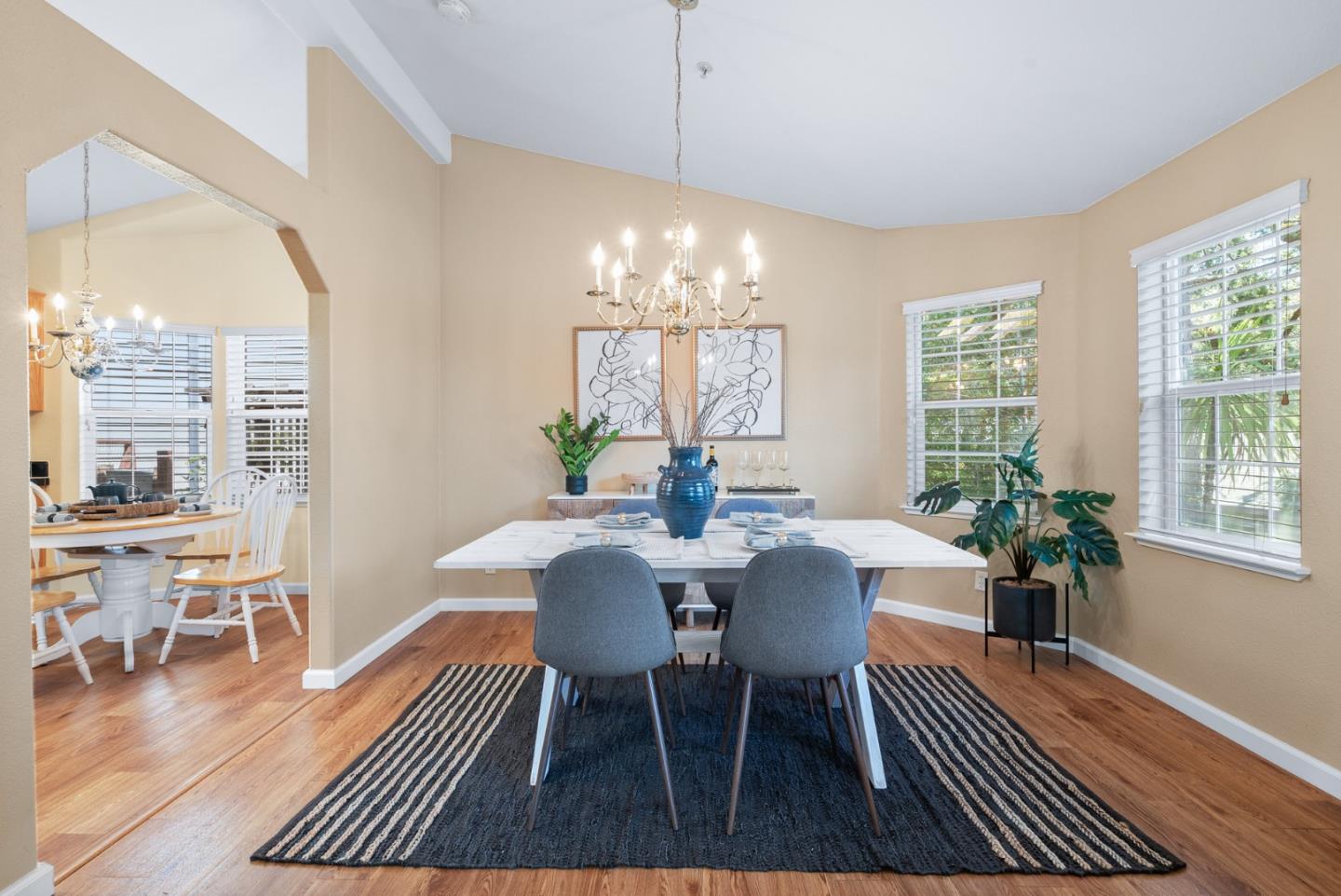 552 Bean Creek Road Scotts Valley, CA 95066 - Photo 20 of 76 a view of a dining room with furniture wooden floor and chandelier