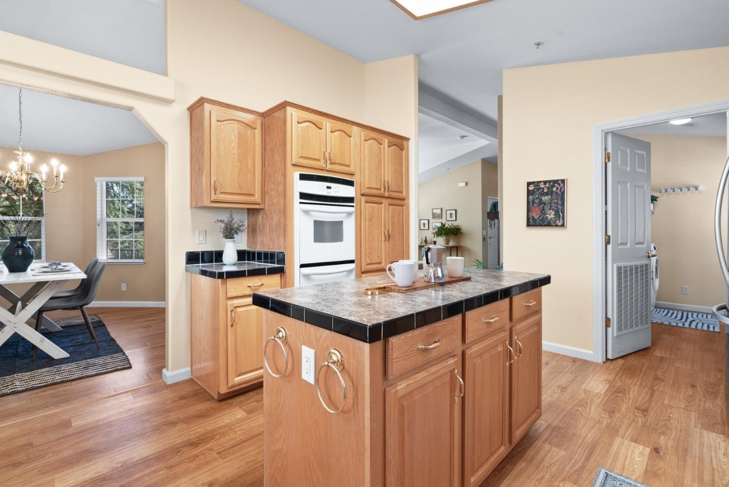 552 Bean Creek Road Scotts Valley, CA 95066 - Photo 28 of 76 a kitchen with stainless steel appliances granite countertop a sink and a stove top oven