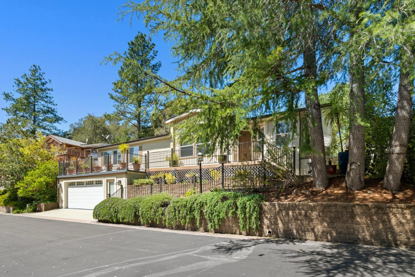 552 Bean Creek Road Scotts Valley, CA 95066 - Photo 3 of 76 a front view of a house with a yard