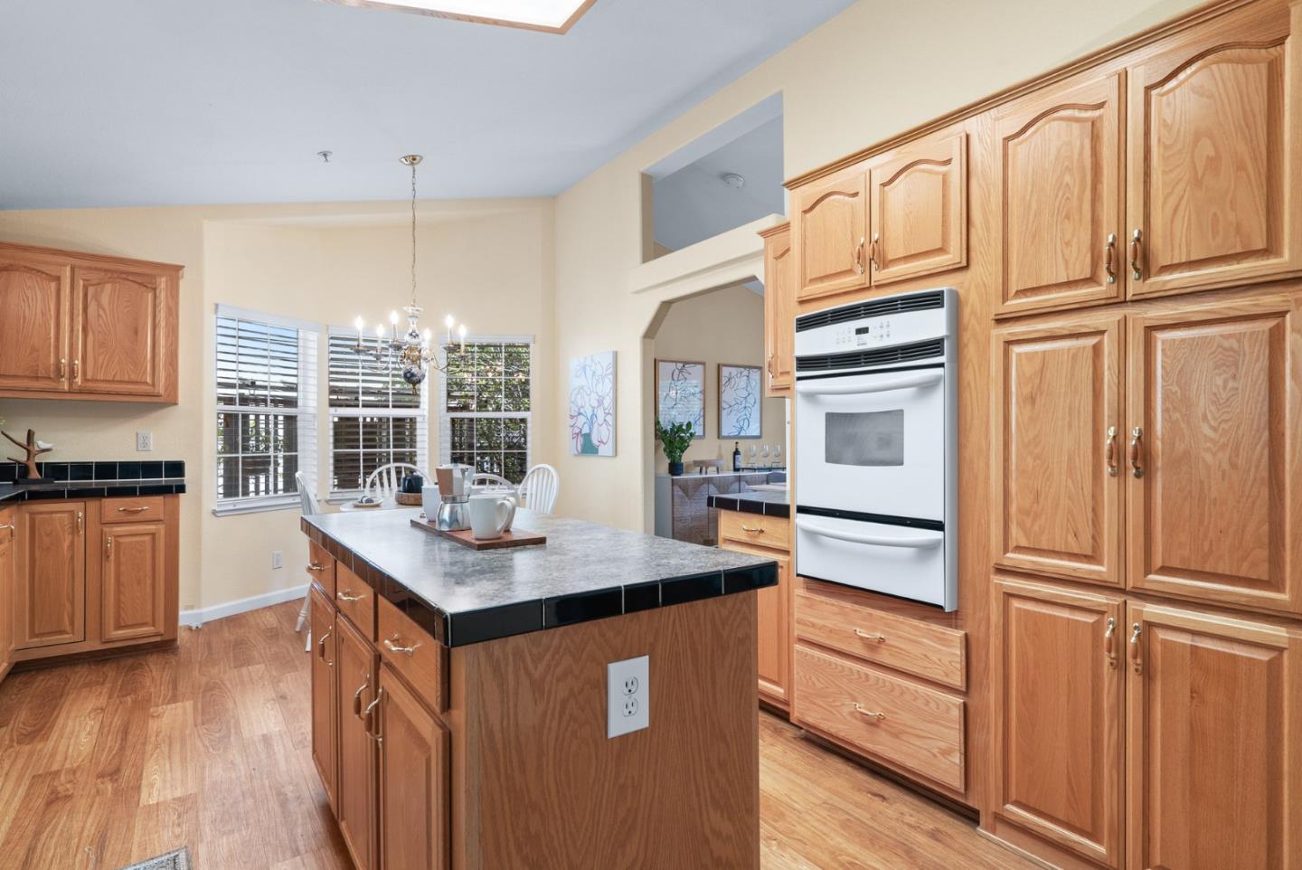 552 Bean Creek Road Scotts Valley, CA 95066 - Photo 31 of 76 a kitchen with stainless steel appliances granite countertop a stove and a refrigerator