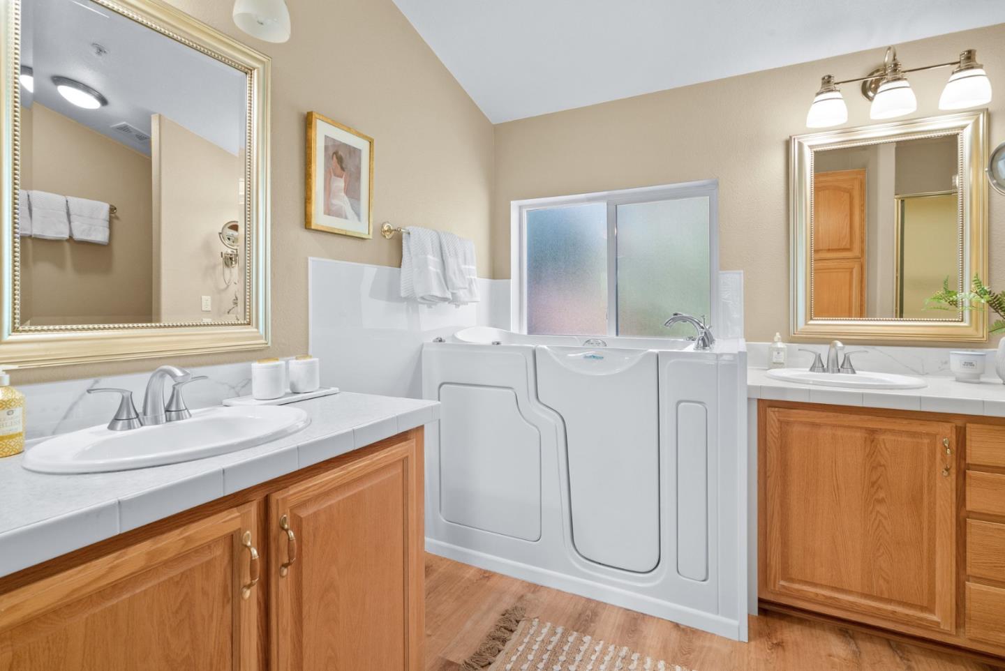 552 Bean Creek Road Scotts Valley, CA 95066 - Photo 44 of 76 a bathroom with a granite countertop sink and a mirror