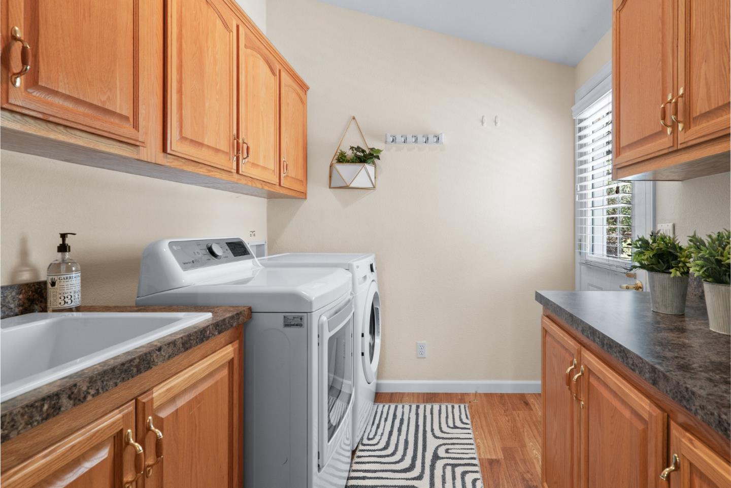 552 Bean Creek Road Scotts Valley, CA 95066 - Photo 47 of 76 a view of a kitchen with sink and washing machine