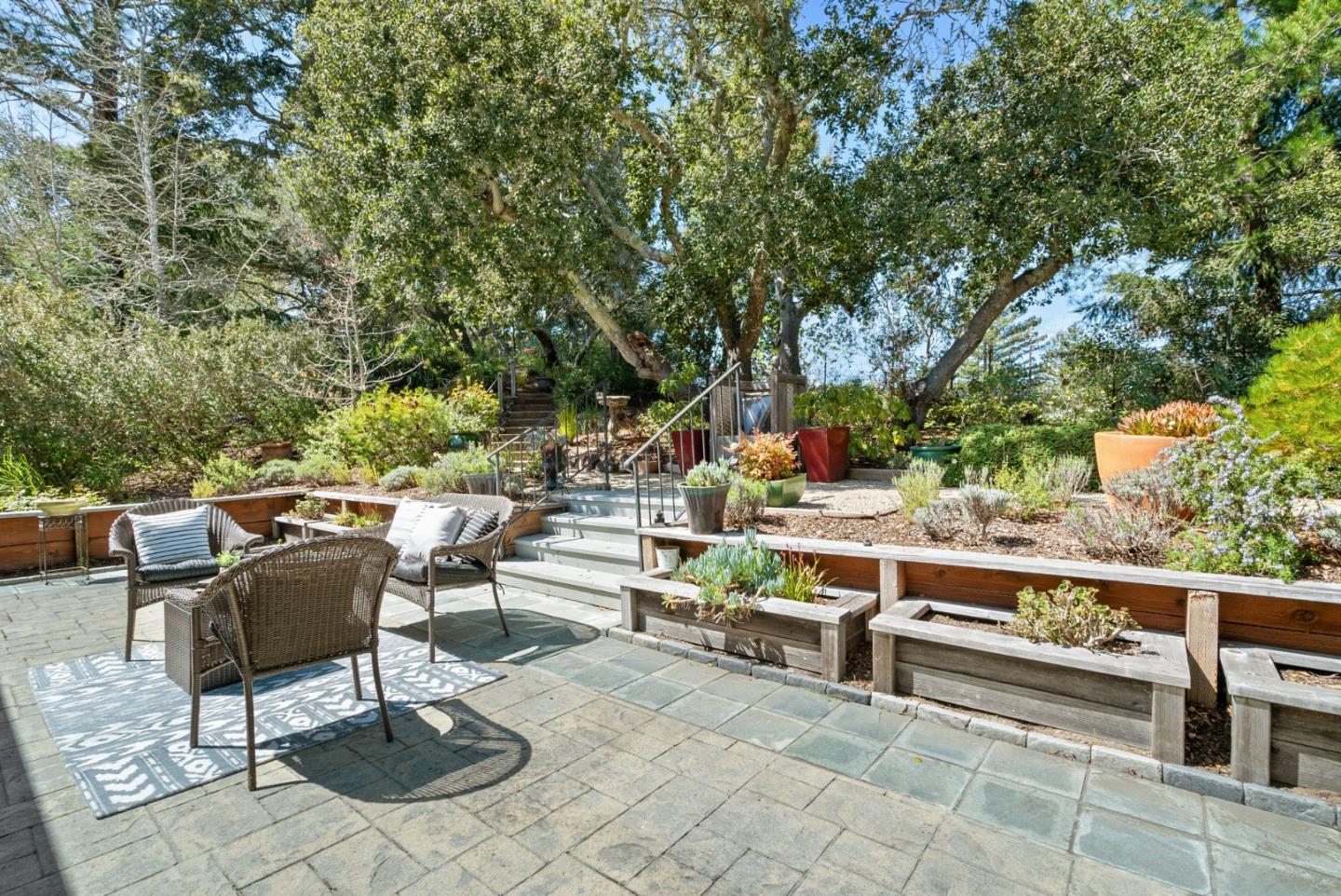 552 Bean Creek Road Scotts Valley, CA 95066 - Photo 55 of 76 a view of an outdoor sitting area with fire pit