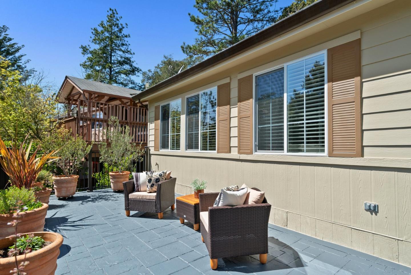 552 Bean Creek Road Scotts Valley, CA 95066 - Photo 6 of 76 a outdoor living space with patio furniture and potted plants