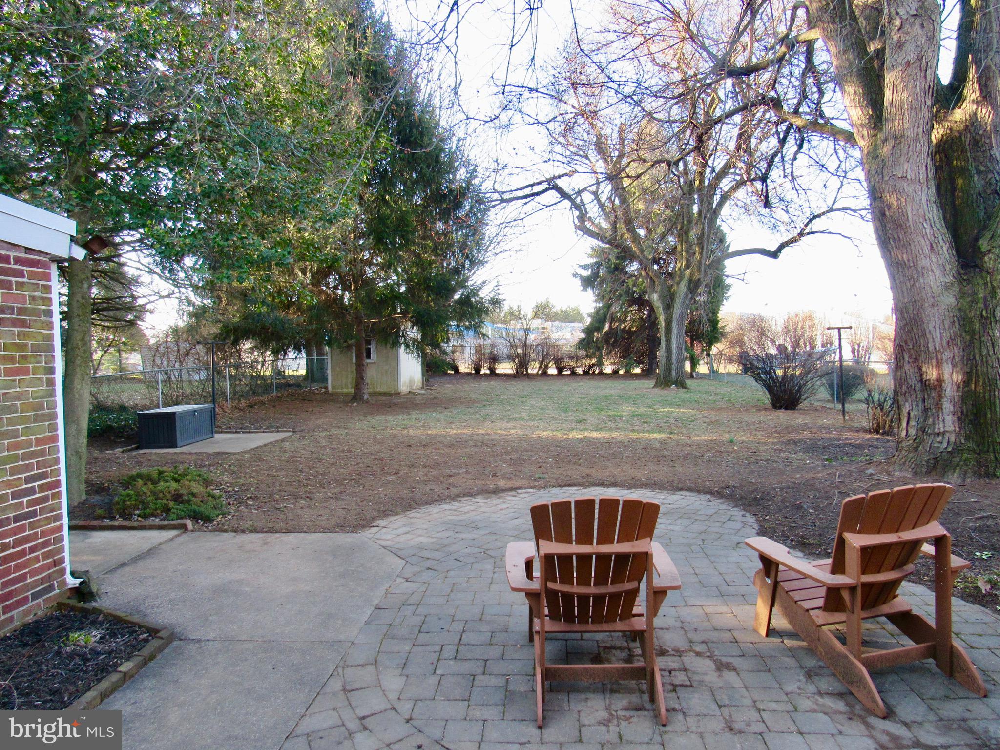 1116 Valley View Road York, PA 17403 - Photo 26 of 27 Patio and view of fenced yard and garden shed