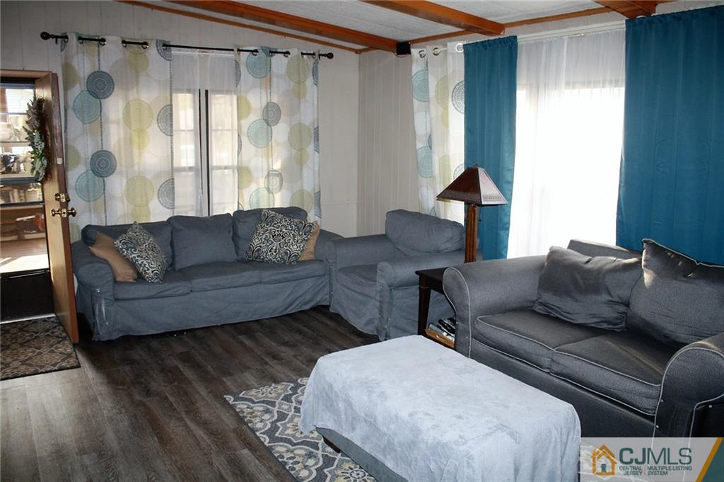 2 Hugo Road North Brunswick, NJ 08902 - Photo 12 of 14 a living room with furniture and a window