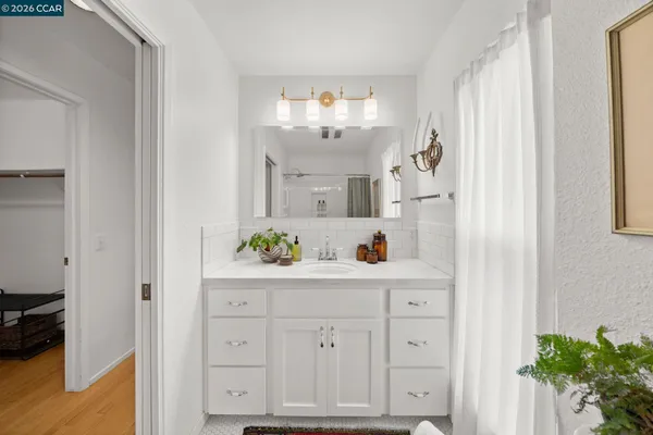 a view of cabinets and wooden floor