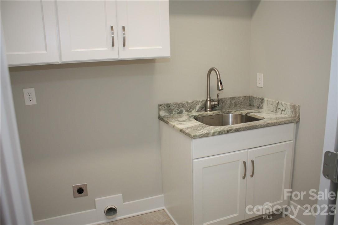 651 Bellegray Road Clover, SC 29710 - Photo 26 of 39 a bathroom with a sink and cabinets