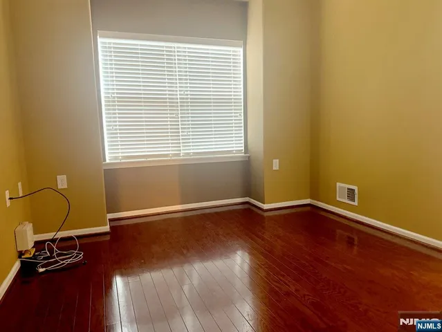 a bathroom with a double vanity sink toilet and shower