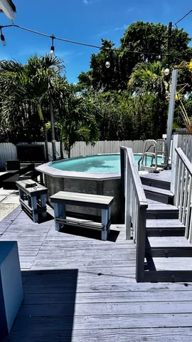 a view of an house with backyard space and garden
