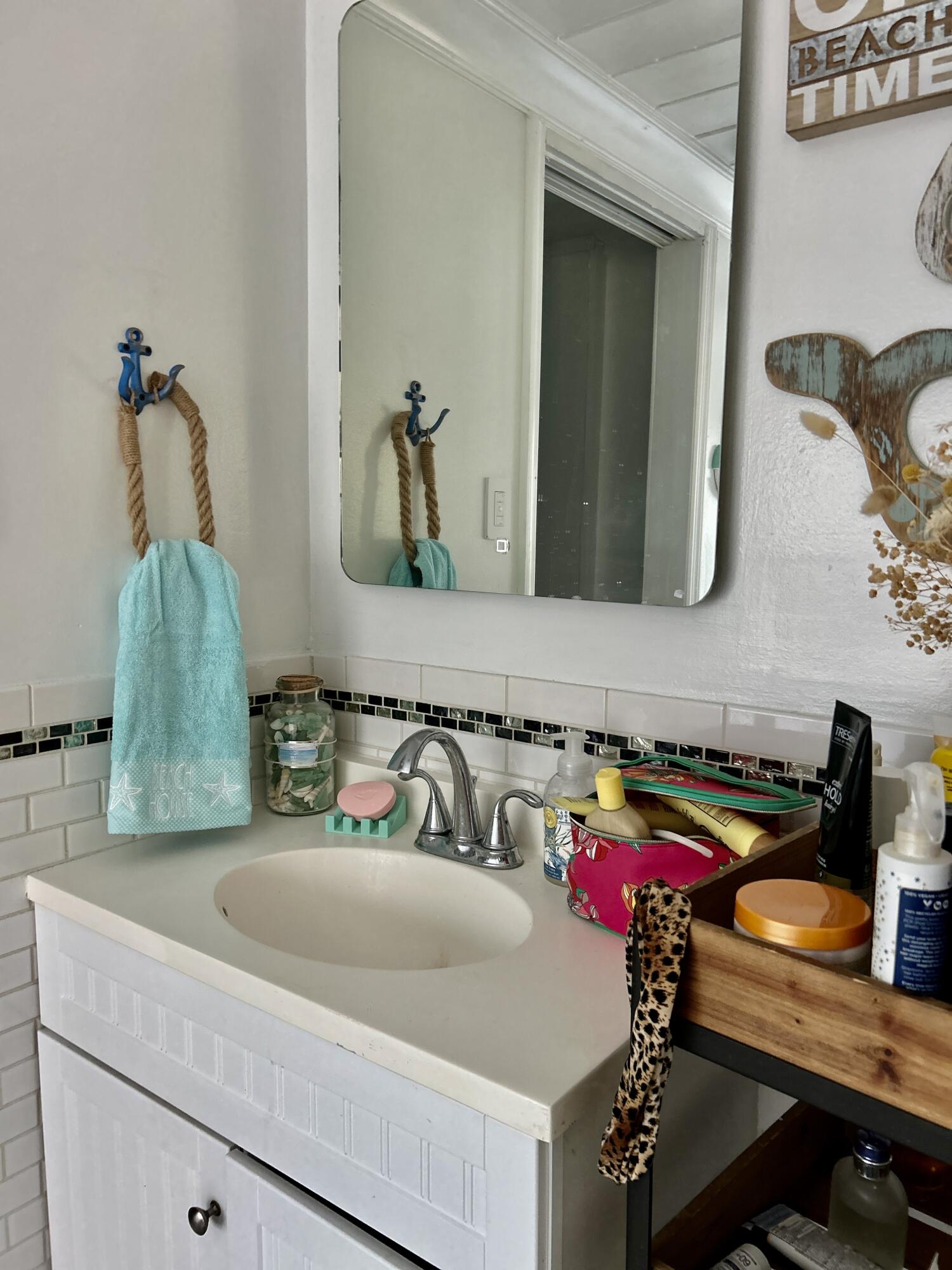 124 South Bay Harbor Drive Key Largo, FL 33037 - Photo 26 of 43 a bathroom with a sink and mirror