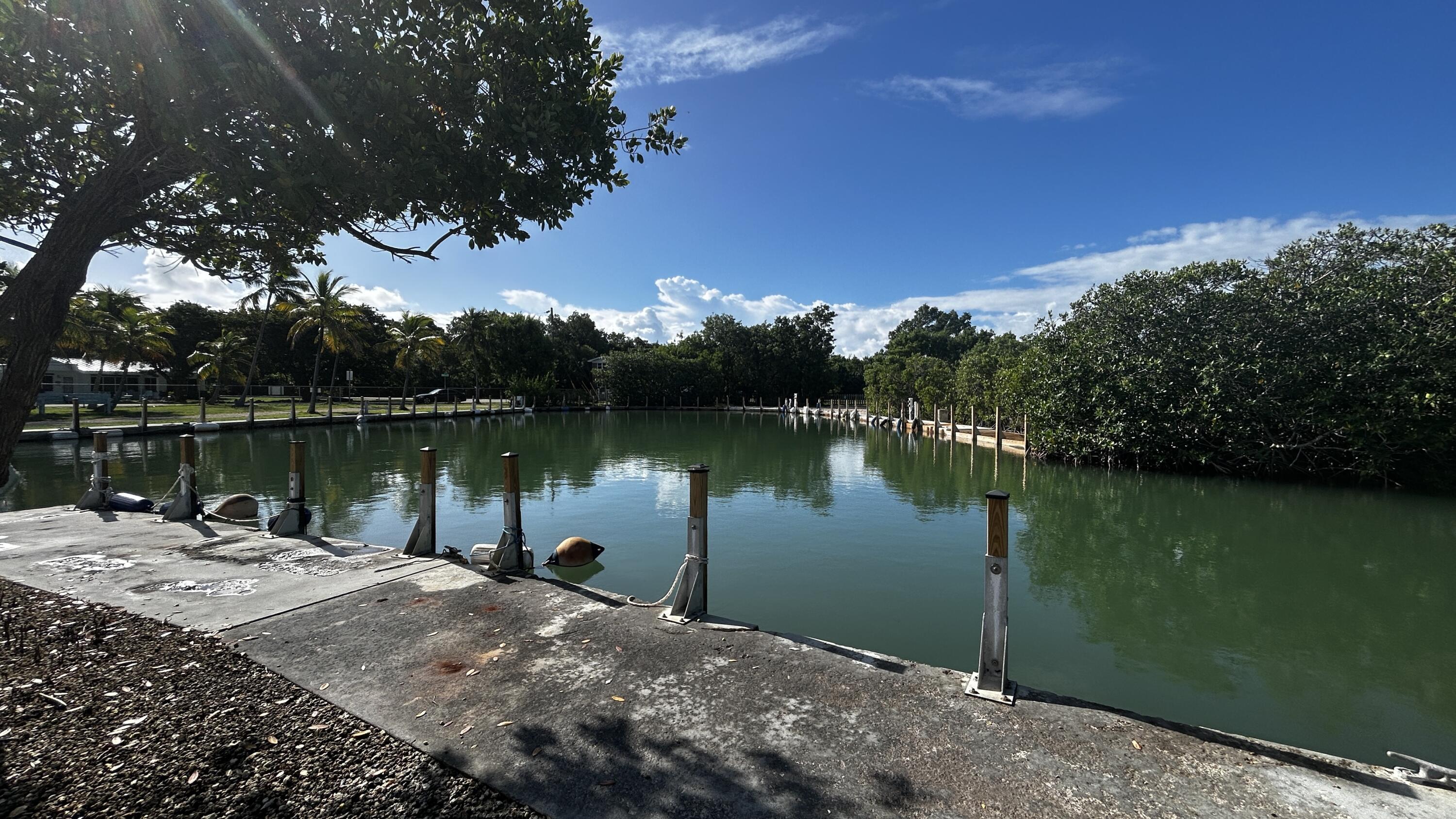 124 South Bay Harbor Drive Key Largo, FL 33037 - Photo 3 of 43 a lake view with a lake view