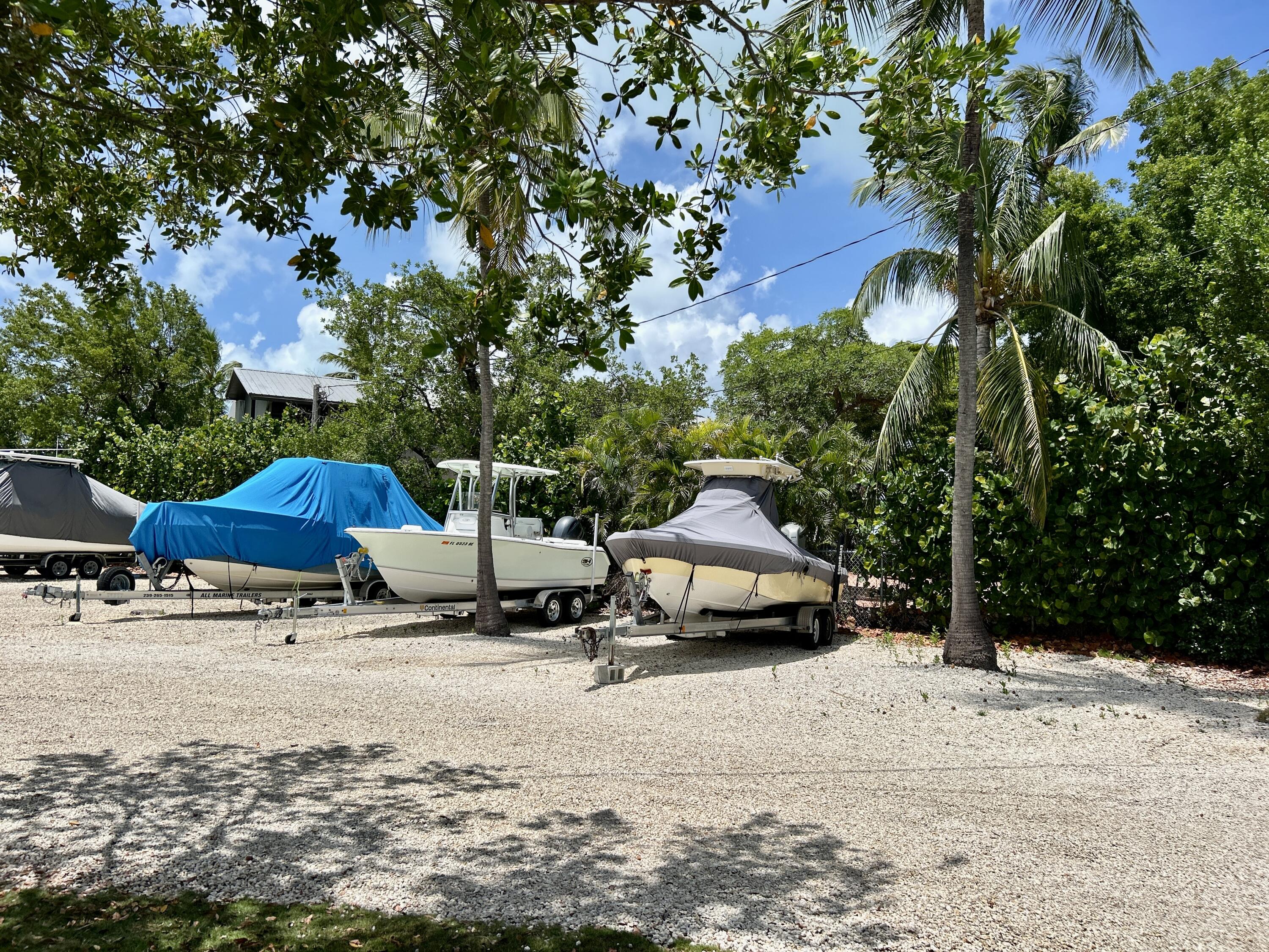 124 South Bay Harbor Drive Key Largo, FL 33037 - Photo 33 of 43 a view of street with parked cars