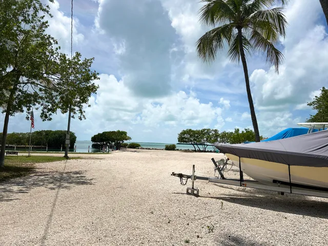a view of lake with green space