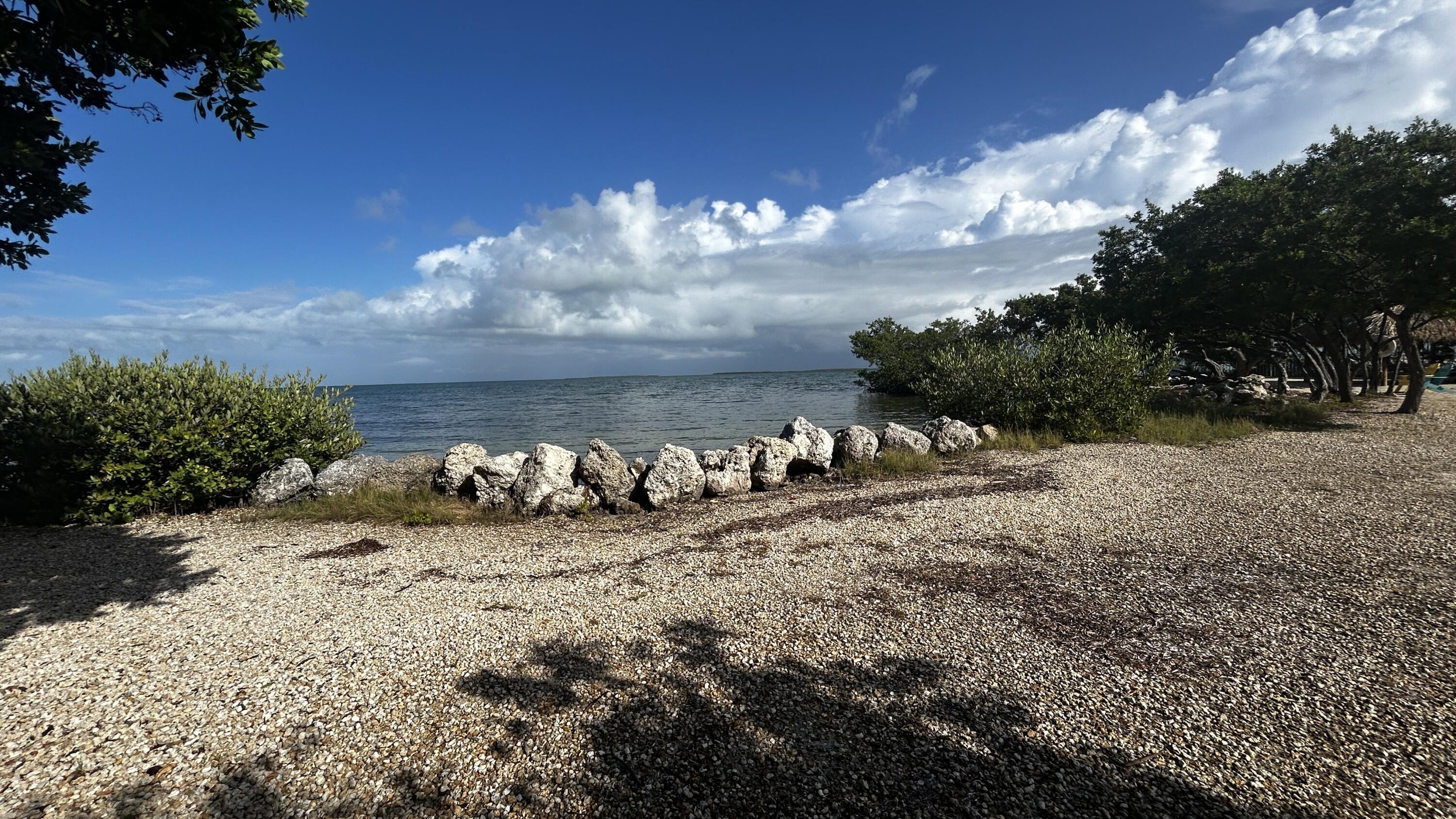 124 South Bay Harbor Drive Key Largo, FL 33037 - Photo 42 of 43 a view of a house with a yard