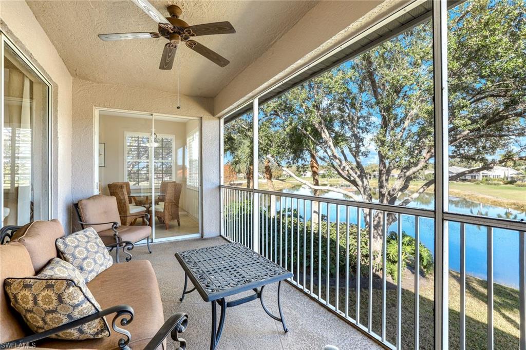 2033 Crestview Way, Unit 104 Naples, FL 34119 - Photo 16 of 24 a living room with furniture and a window