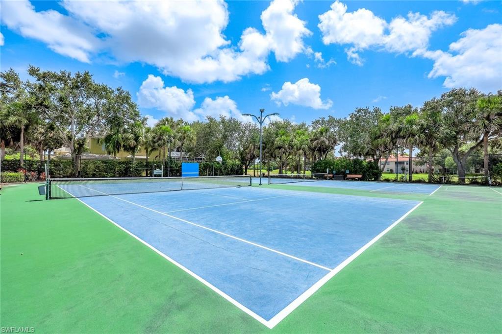 2033 Crestview Way, Unit 104 Naples, FL 34119 - Photo 23 of 24 a view of a green field