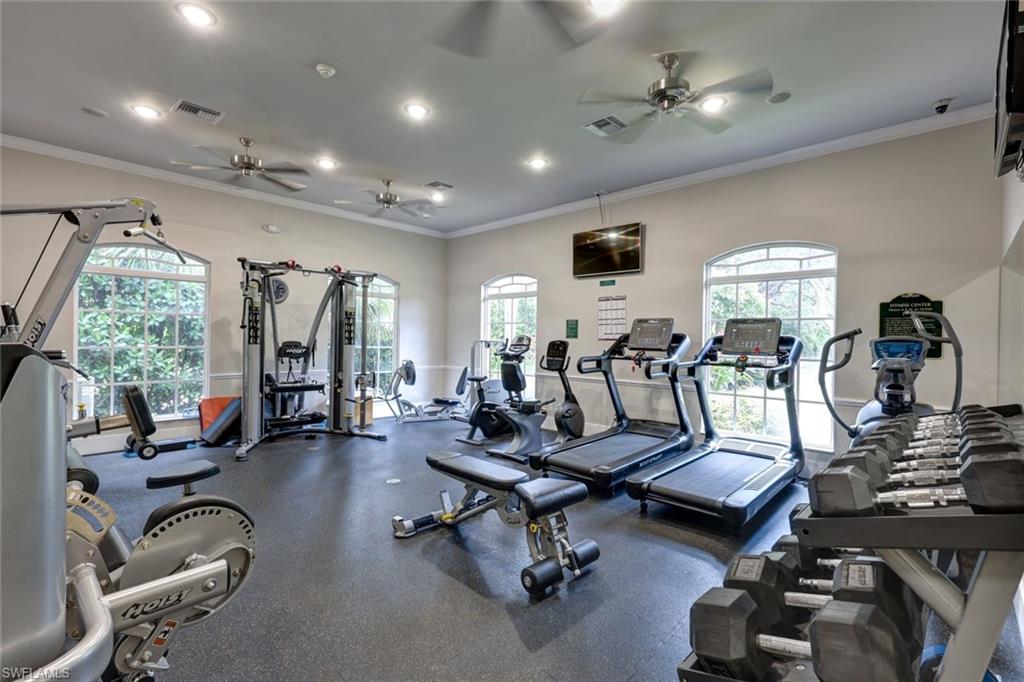 2033 Crestview Way, Unit 104 Naples, FL 34119 - Photo 24 of 24 a view of a room with gym equipment