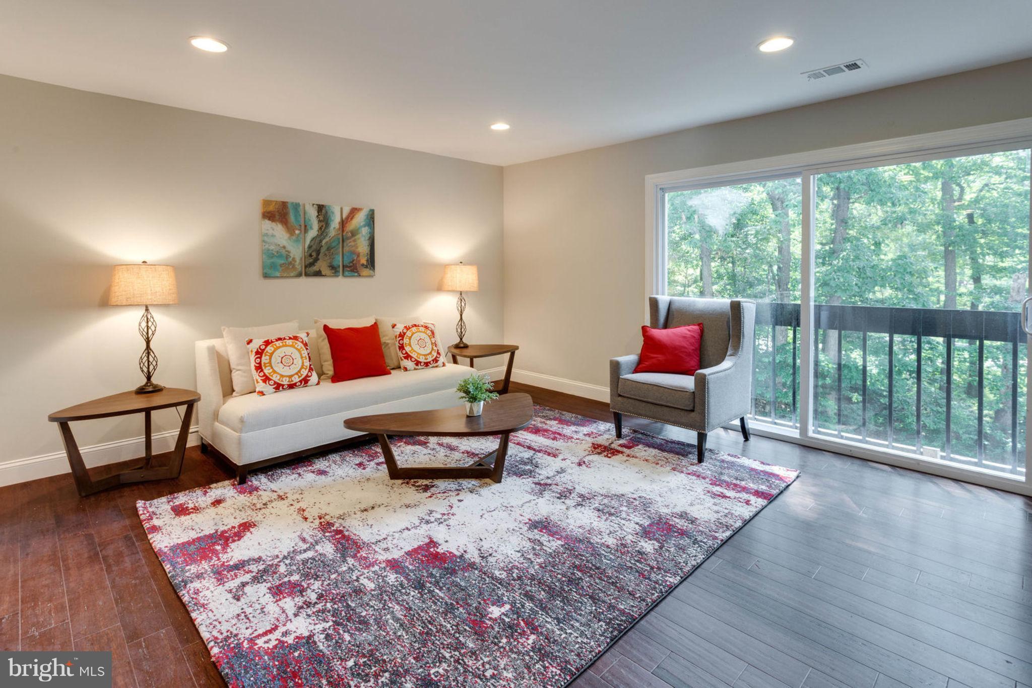 2349 Southgate Square Reston, VA 20191 - Photo 15 of 30 a living room with furniture and a rug