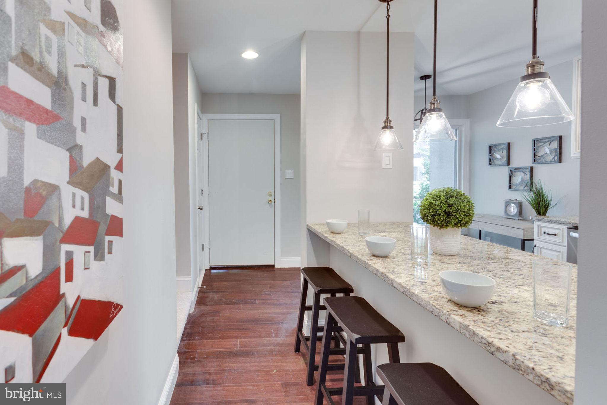 2349 Southgate Square Reston, VA 20191 - Photo 3 of 30 a view of a kitchen and dining room
