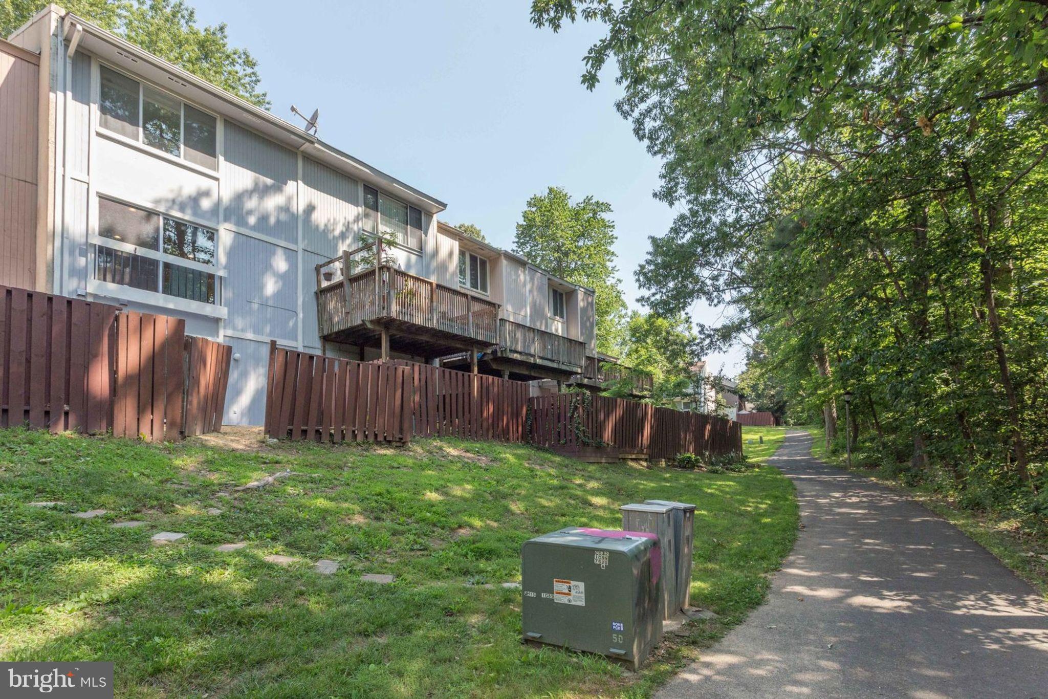 2349 Southgate Square Reston, VA 20191 - Photo 30 of 30 front view of a house with a yard