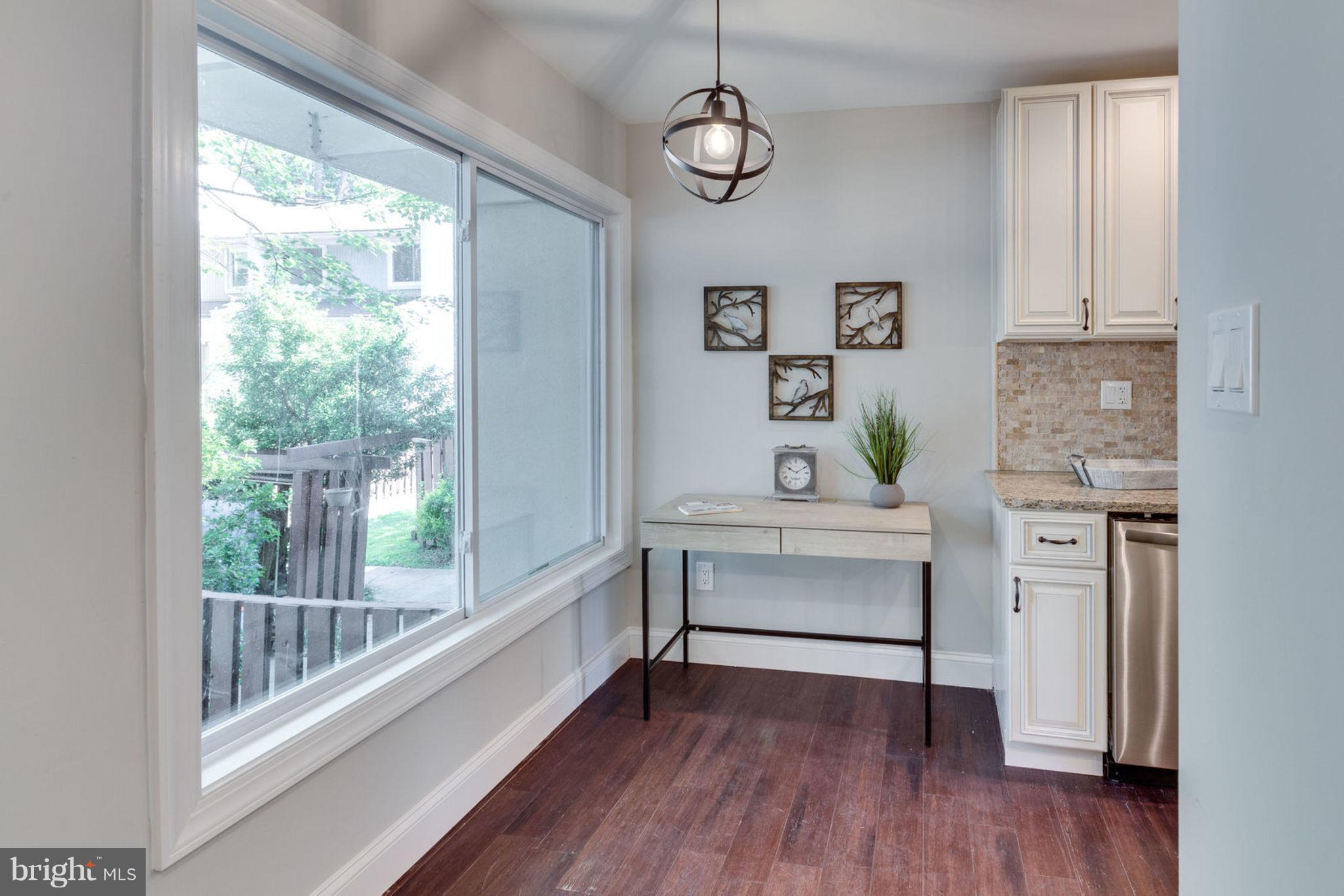 2349 Southgate Square Reston, VA 20191 - Photo 5 of 30 a view of room with wooden floor and fan