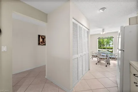 a view of a livingroom with furniture and a window