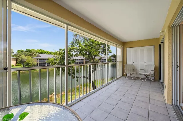 a view of a balcony with lake view
