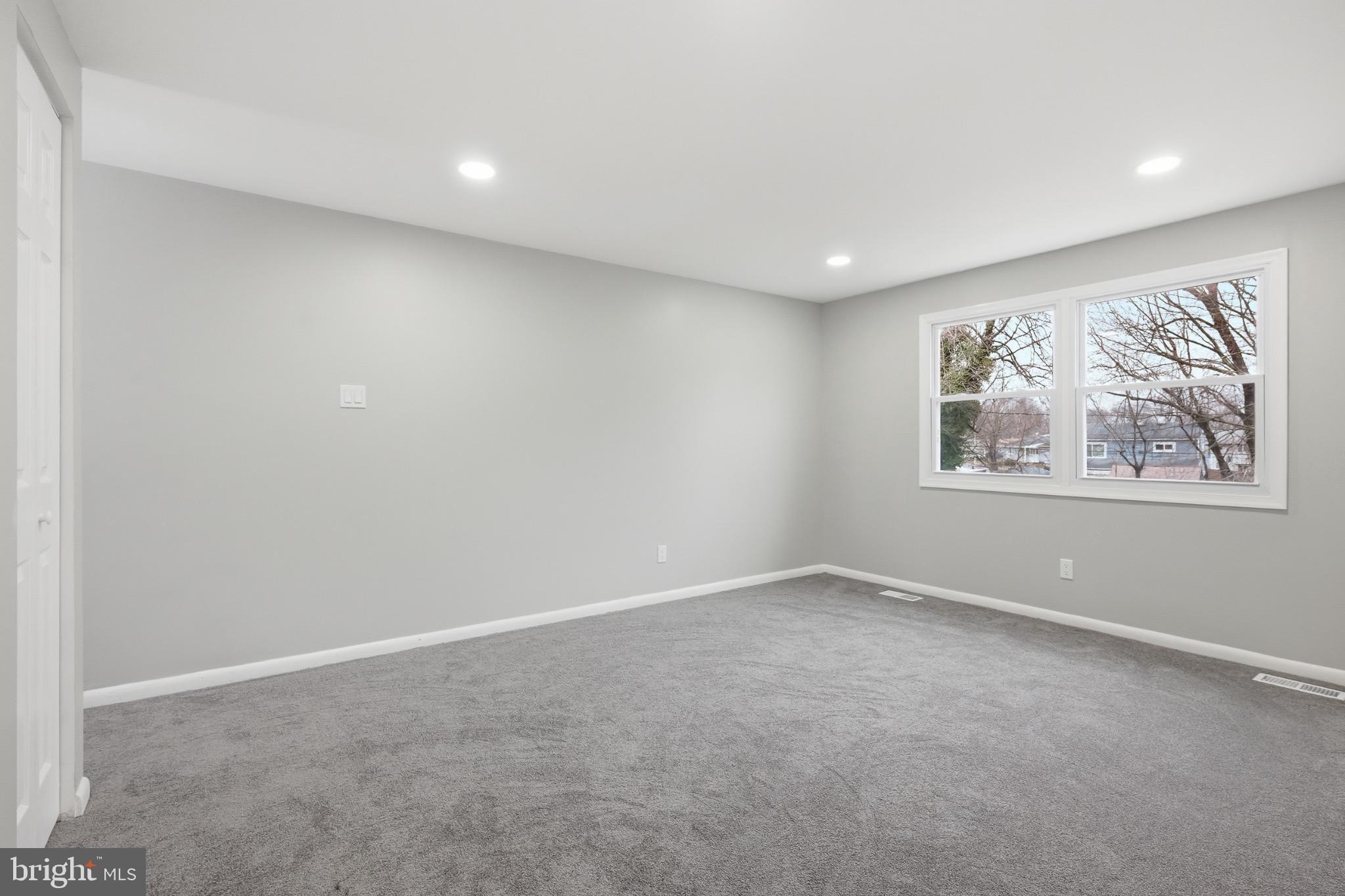 22 Raintree Drive New Castle, DE 19720 - Photo 15 of 29 an empty room with a window