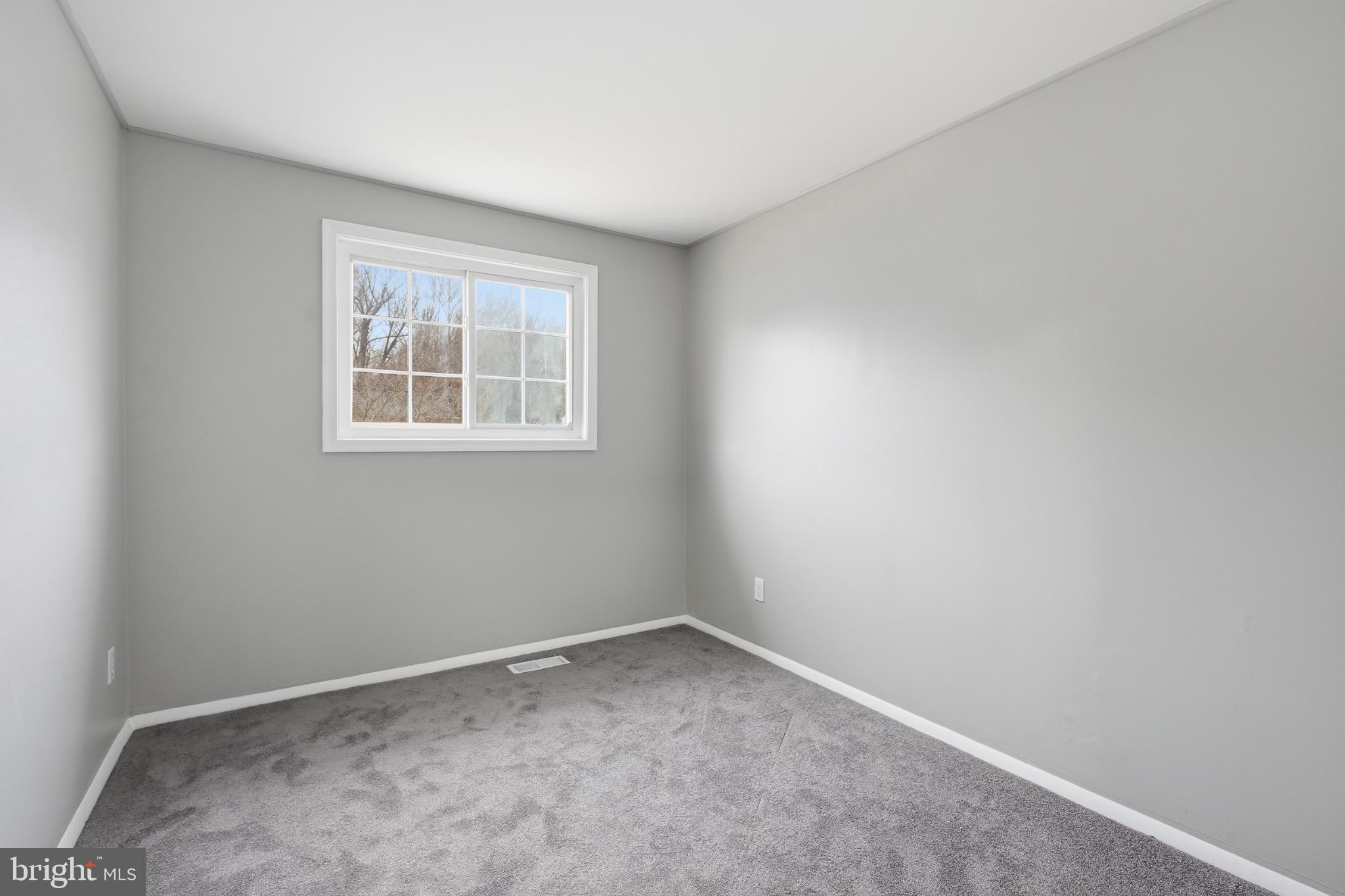 22 Raintree Drive New Castle, DE 19720 - Photo 16 of 29 an empty room with a window