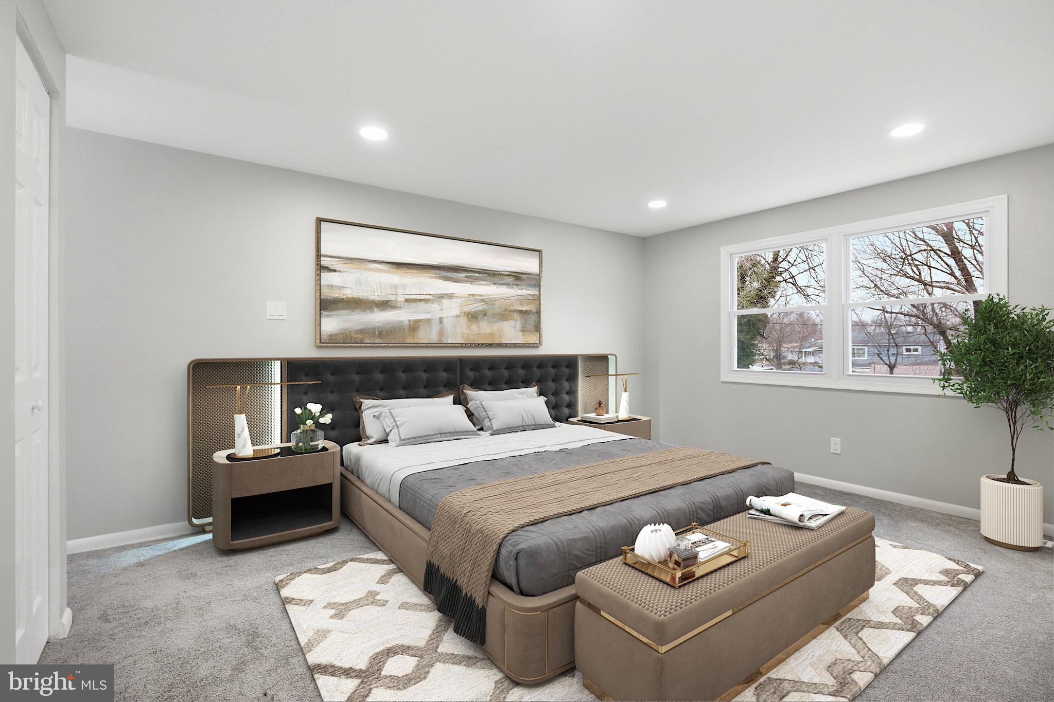 22 Raintree Drive New Castle, DE 19720 - Photo 17 of 29 a bedroom with a bed and wooden floor