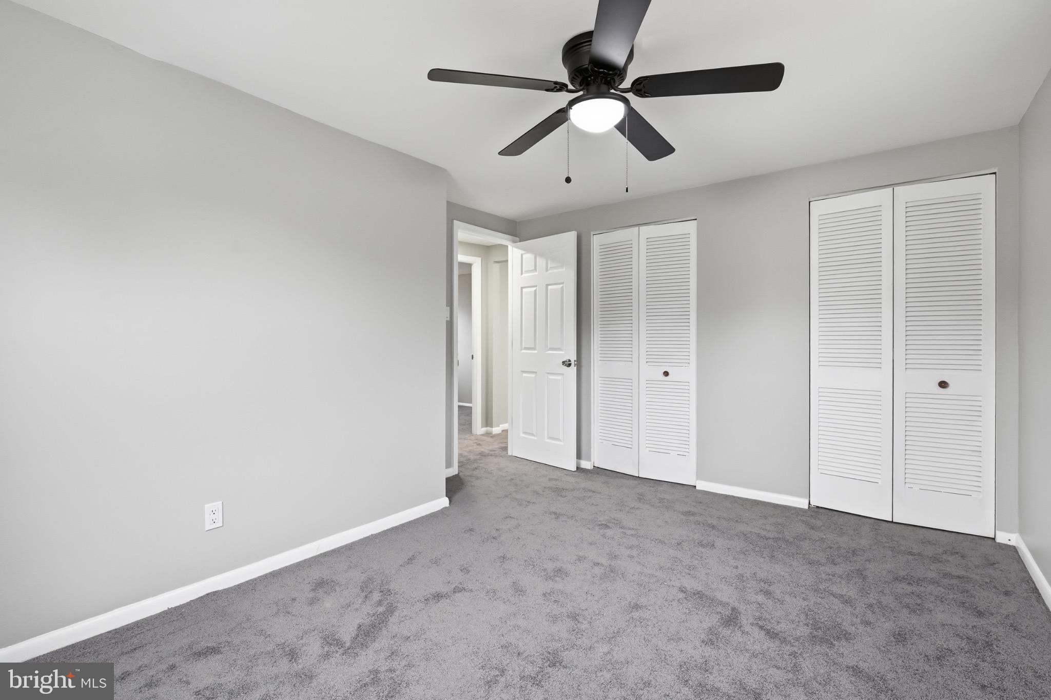 22 Raintree Drive New Castle, DE 19720 - Photo 21 of 29 an empty room with chandelier fan