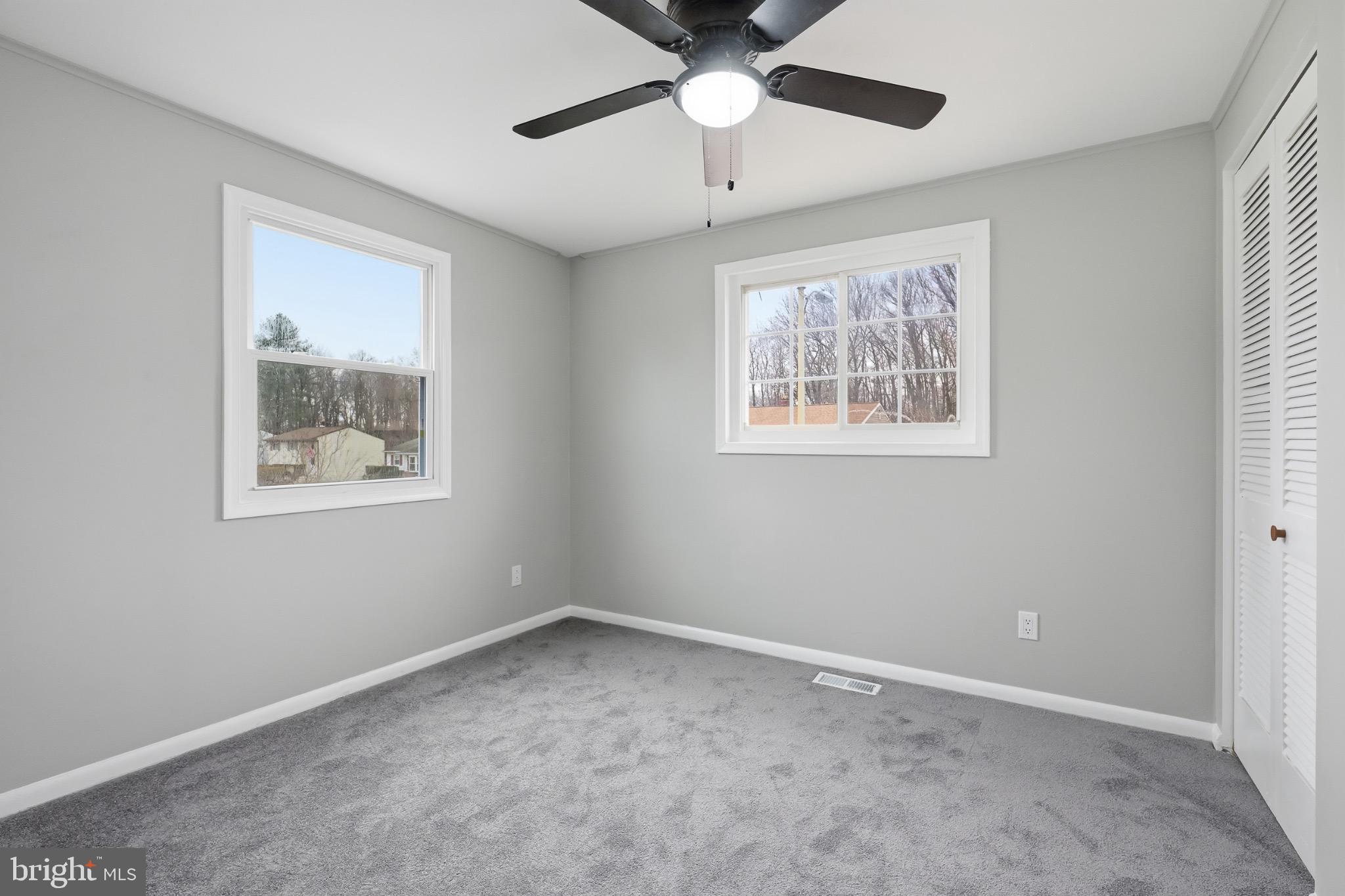 22 Raintree Drive New Castle, DE 19720 - Photo 22 of 29 a view of an empty room with a window