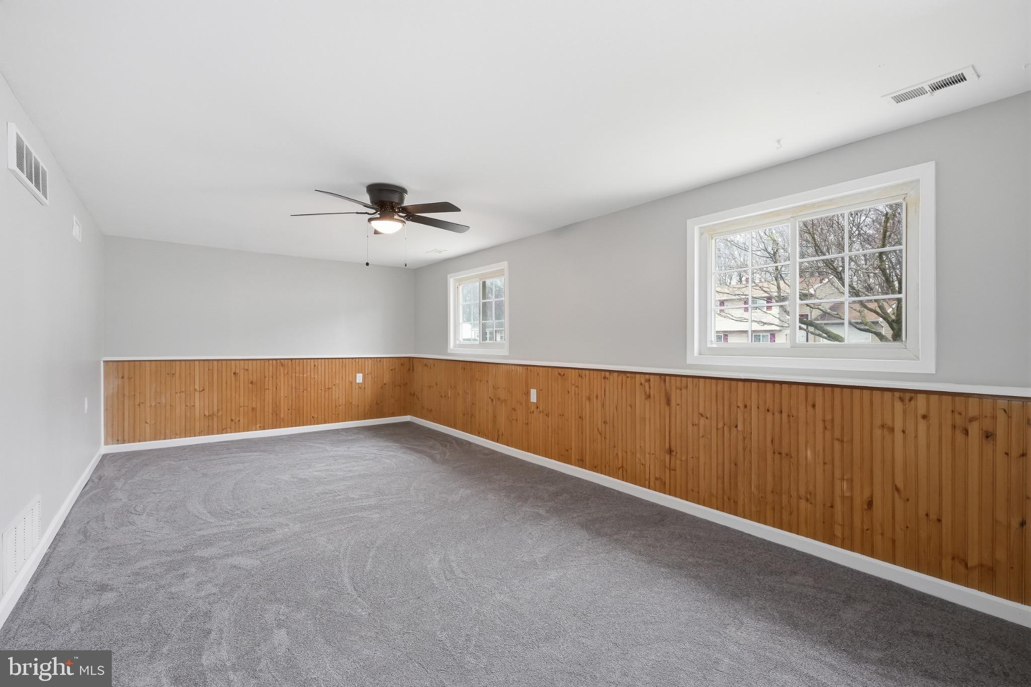 22 Raintree Drive New Castle, DE 19720 - Photo 5 of 29 a view of an empty room with a window