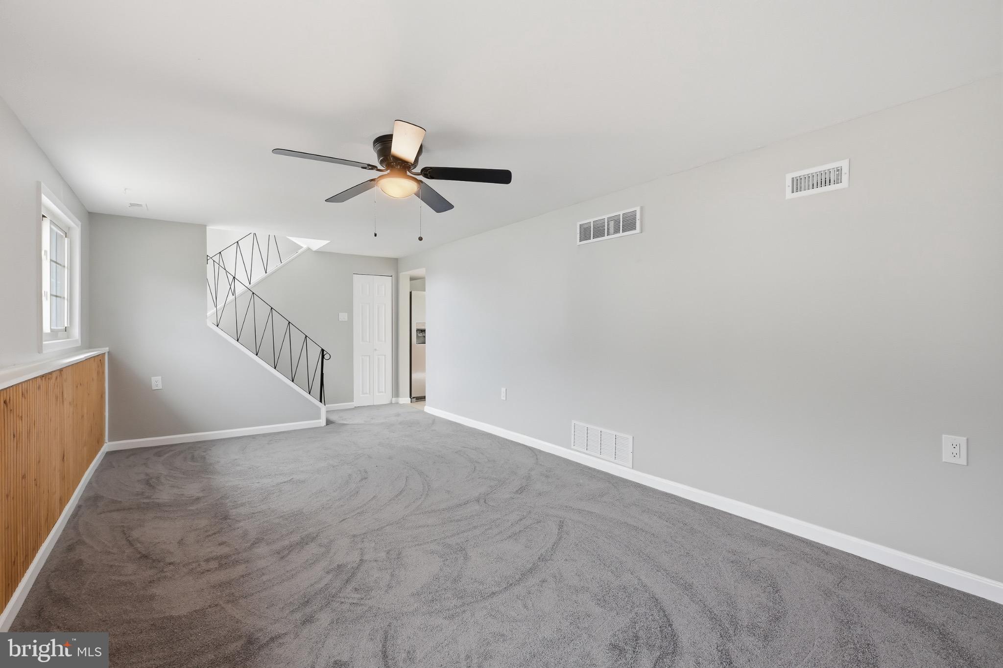 22 Raintree Drive New Castle, DE 19720 - Photo 6 of 29 a view of a big room with carpet
