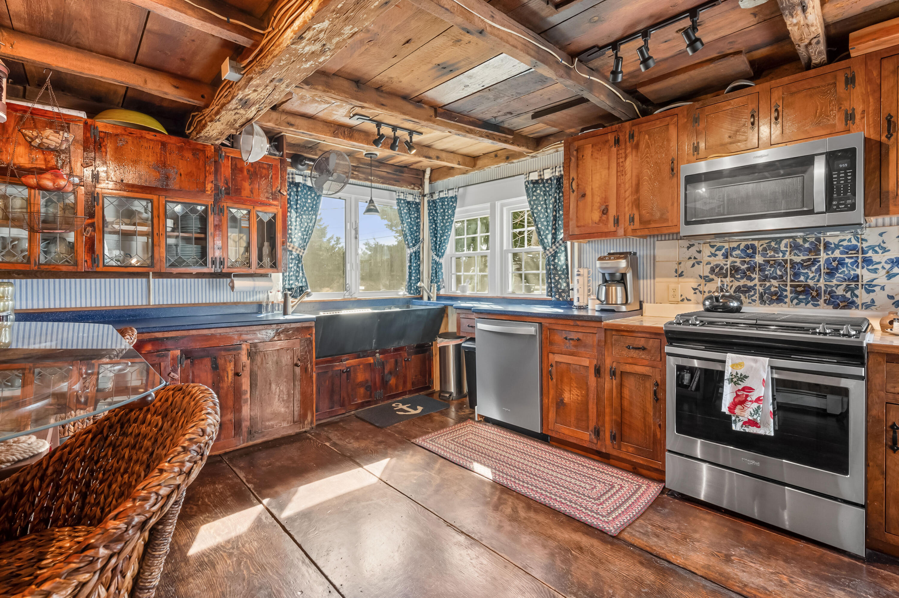 40 Commerce Road Barnstable, MA 02630 - Photo 12 of 43 a kitchen with stainless steel appliances granite countertop a stove and a sink