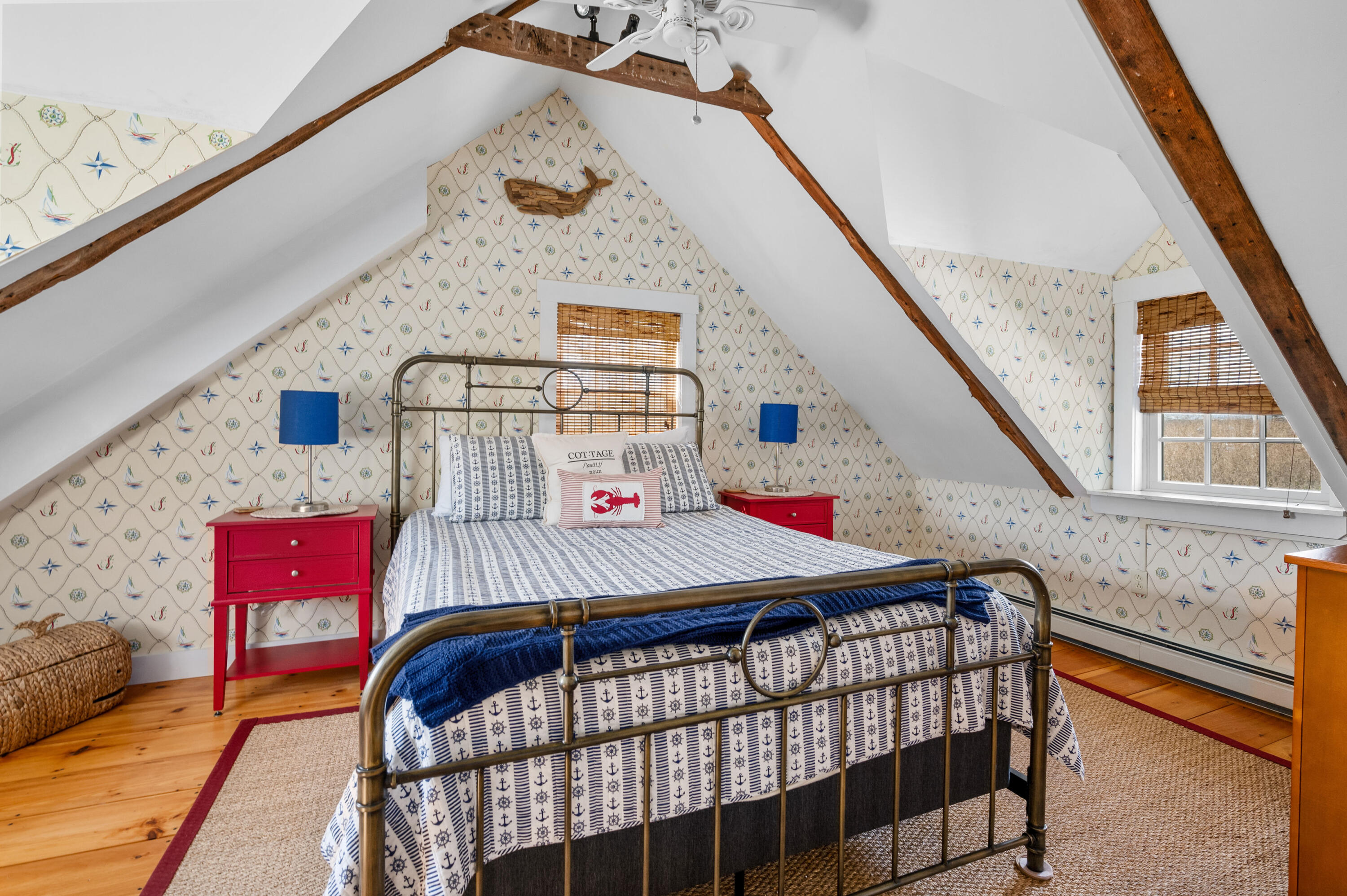 40 Commerce Road Barnstable, MA 02630 - Photo 18 of 43 a bedroom with a bed and a dresser