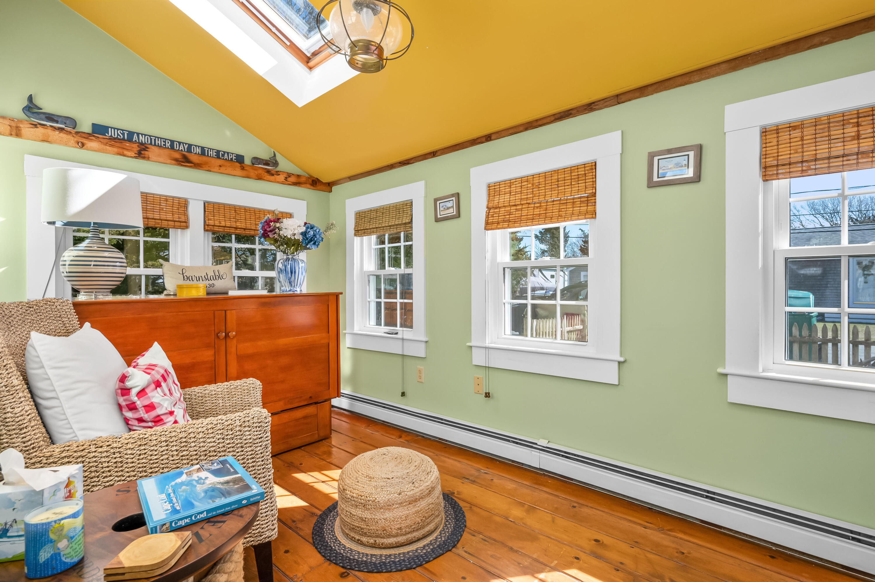 40 Commerce Road Barnstable, MA 02630 - Photo 7 of 43 a living room with furniture and a window