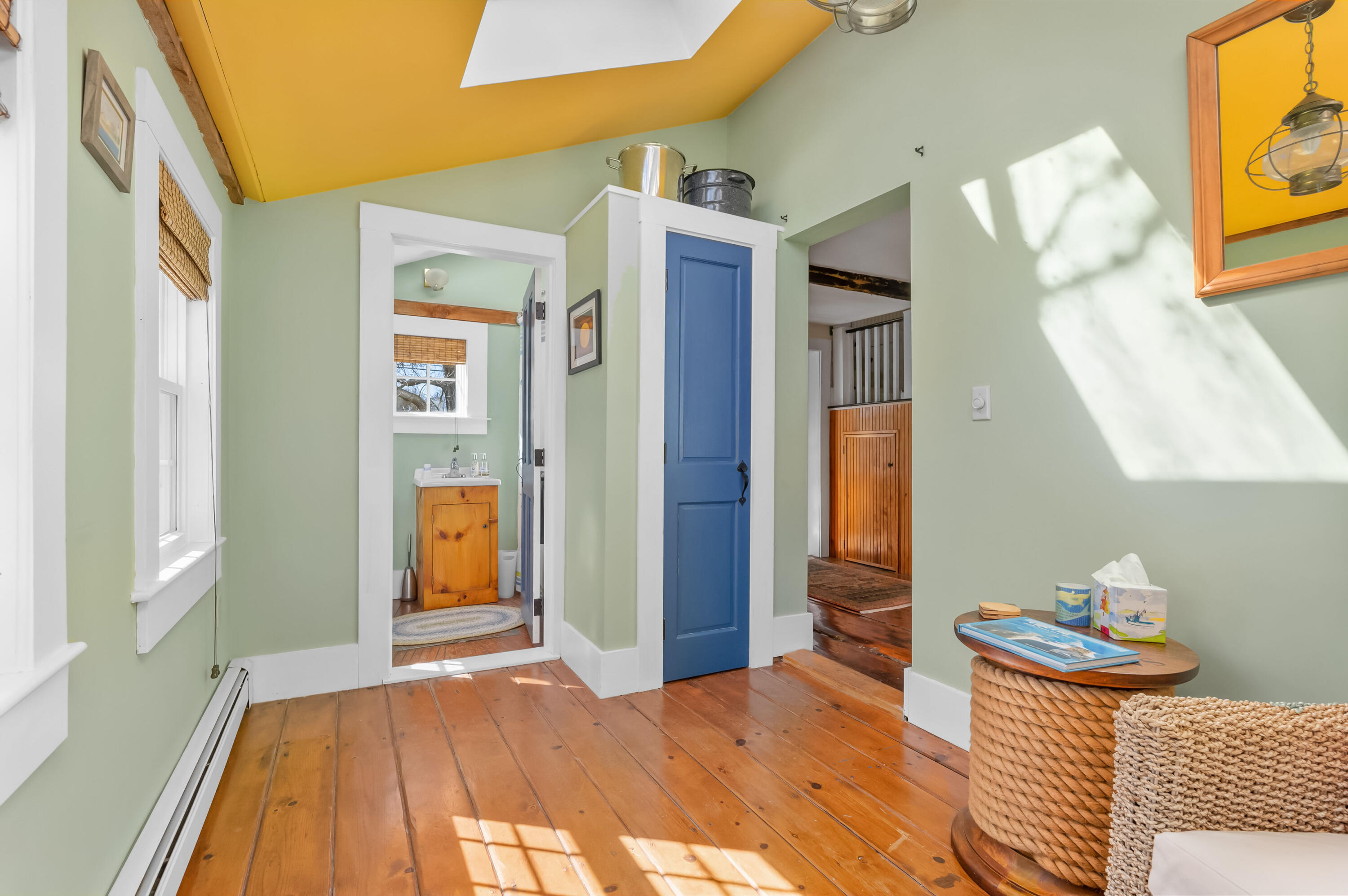 40 Commerce Road Barnstable, MA 02630 - Photo 9 of 43 a bedroom with a bed and a window