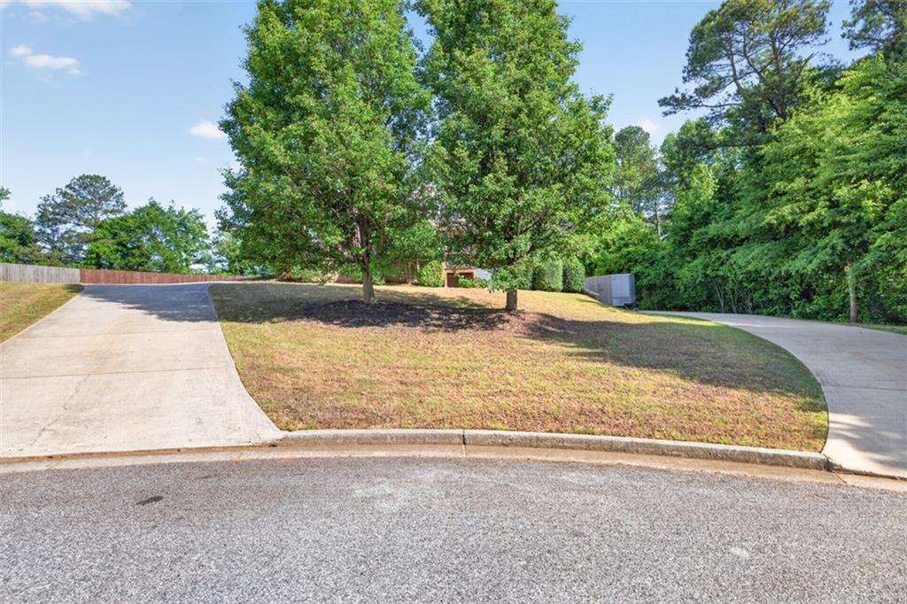 89 Katie Spring Lane Jefferson, GA 30549 - Photo 5 of 63 a view of a backyard of a house