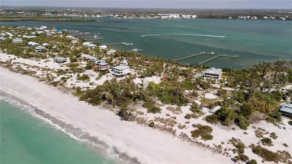 a view of lake with green space