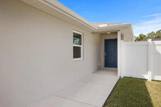 an empty room with a empty space and a window