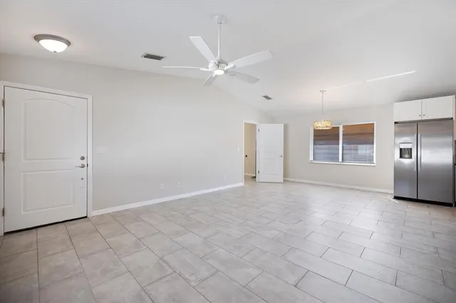 a view of a kitchen with electric appliances