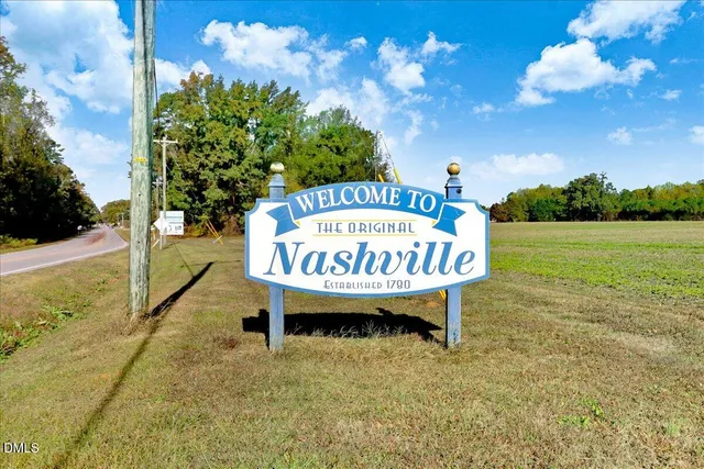 a sign on the side of the road