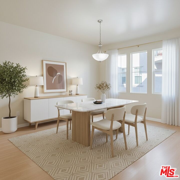 2155 Associated Road Fullerton, CA 92831 - Photo 12 of 47 a dining room with furniture a chandelier and wooden floor