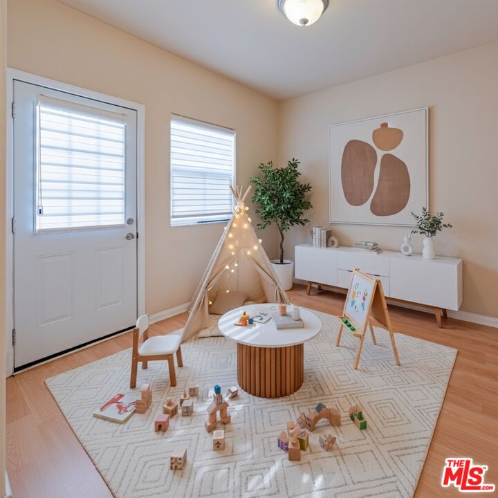 2155 Associated Road Fullerton, CA 92831 - Photo 23 of 47 a living room with furniture and a wooden floor