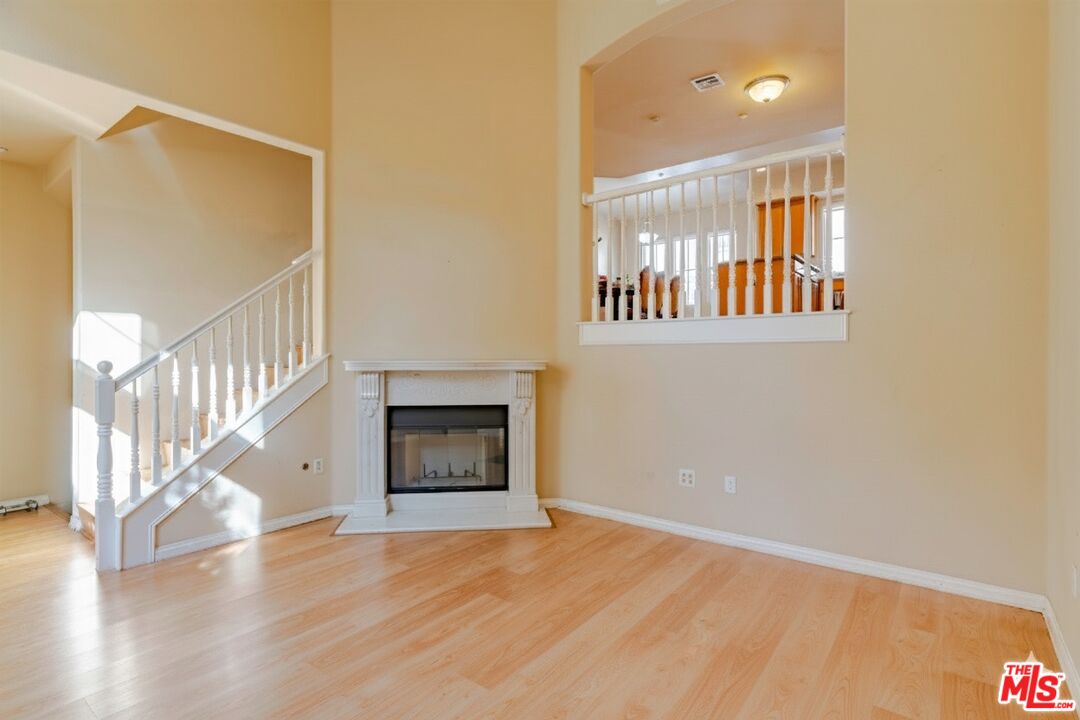 2155 Associated Road Fullerton, CA 92831 - Photo 5 of 47 a view of entryway and hall with wooden floor